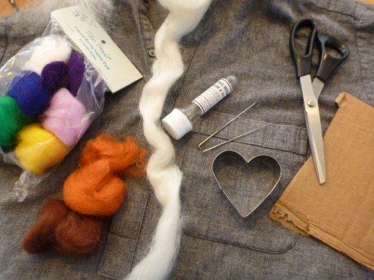 Needle felting supplies: wool, scissors, needles