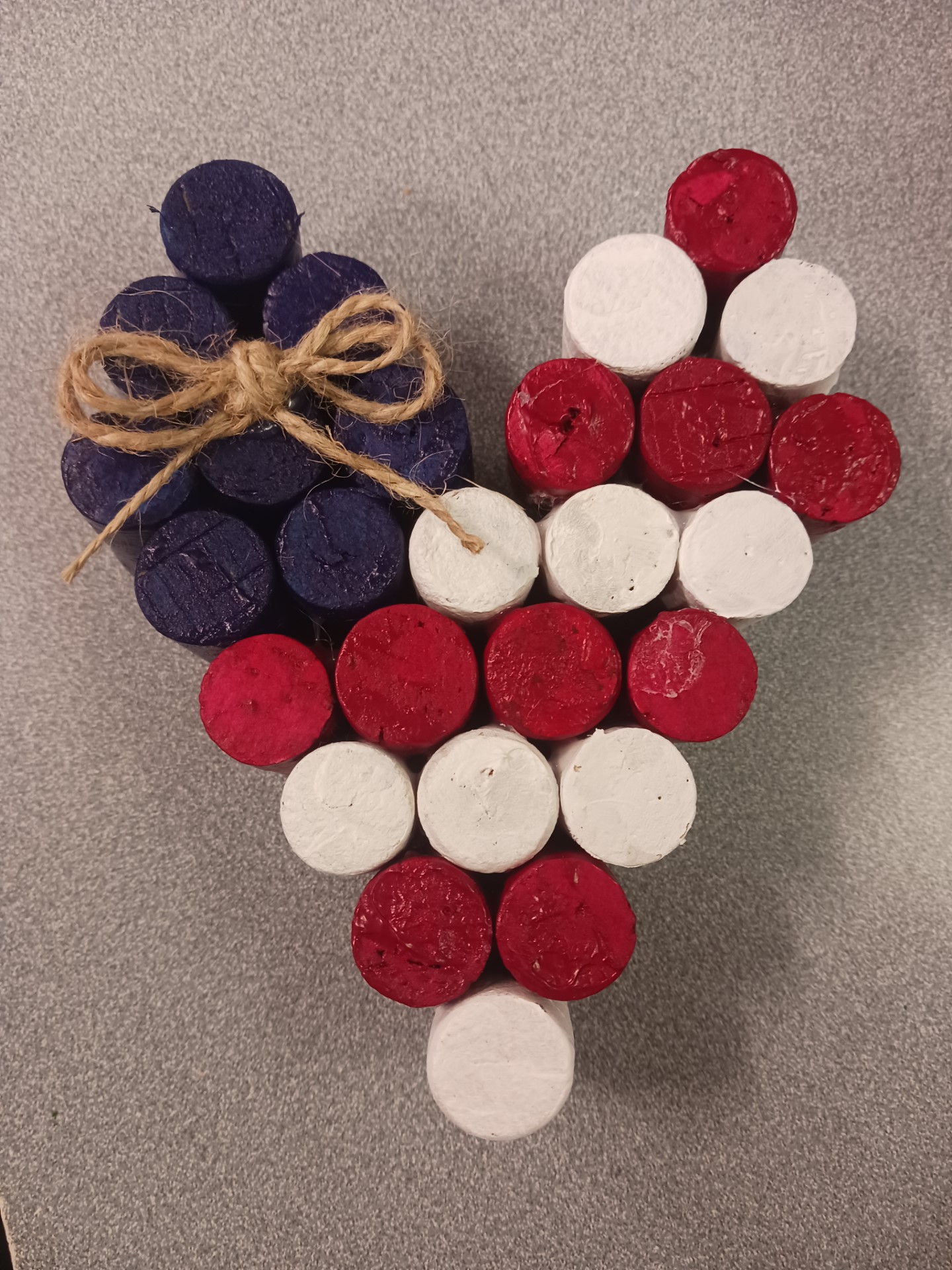Celebrate summer and America's Birthday with us by making this patriotic wine cork heart!