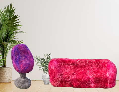 A needle felted chair and couch with a minimalist photo background with plants