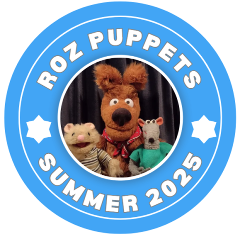 two large blue circles with the words roz puppets and summer 2025 separated by white stars. in the middle is a picture of some of the puppets used in the show