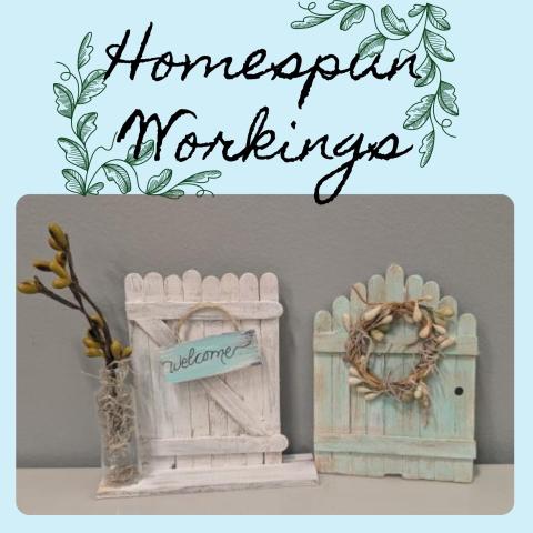 country gates made from popsicle sticks with wreaths and signs