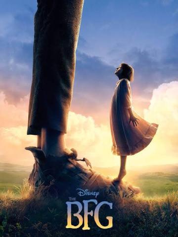 Giant legs with a person standing on the feet and the words "Disney, The BFG" under it