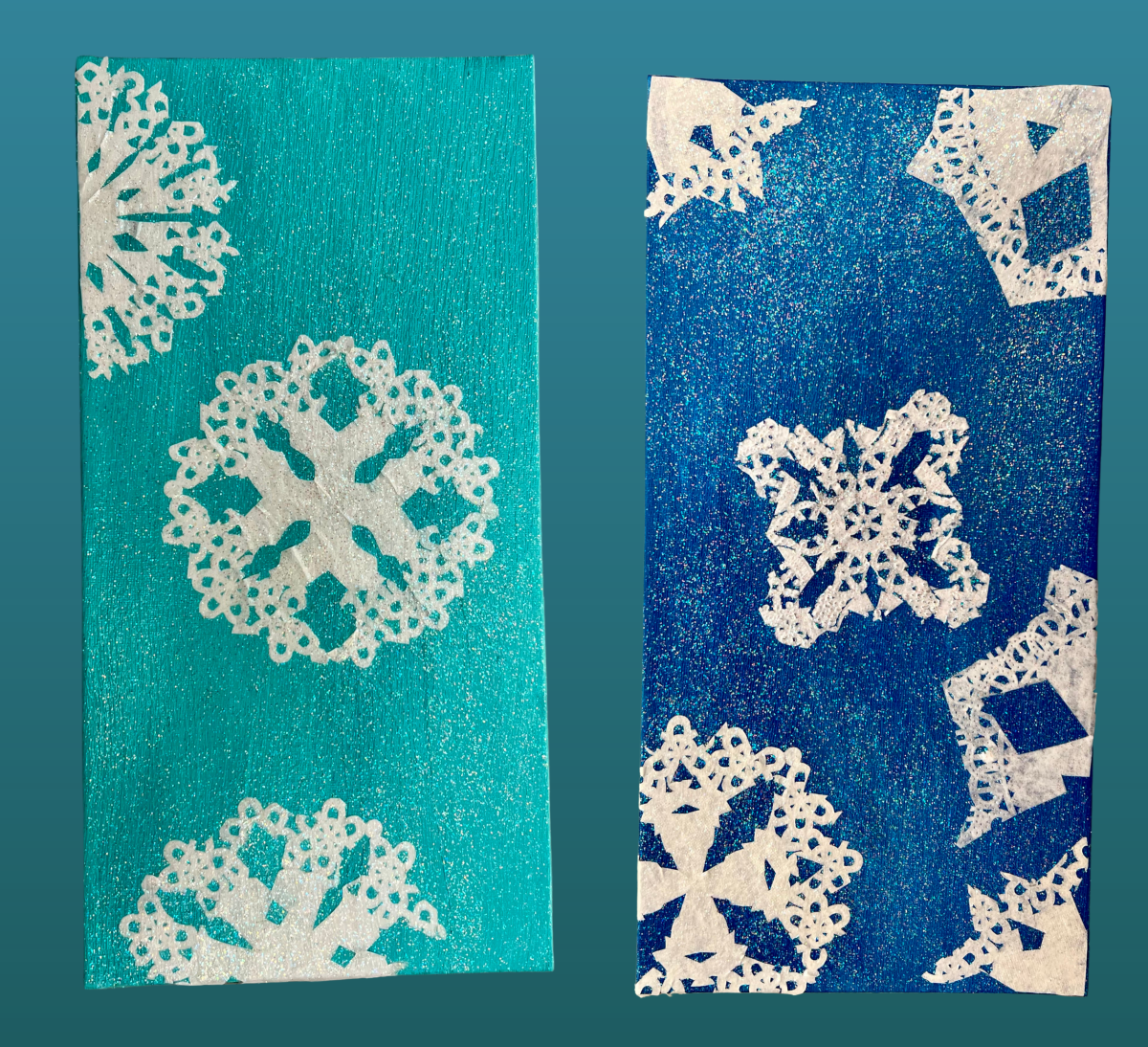 Painted Panels with paper doily snowflakes affixed with glitter mod podge