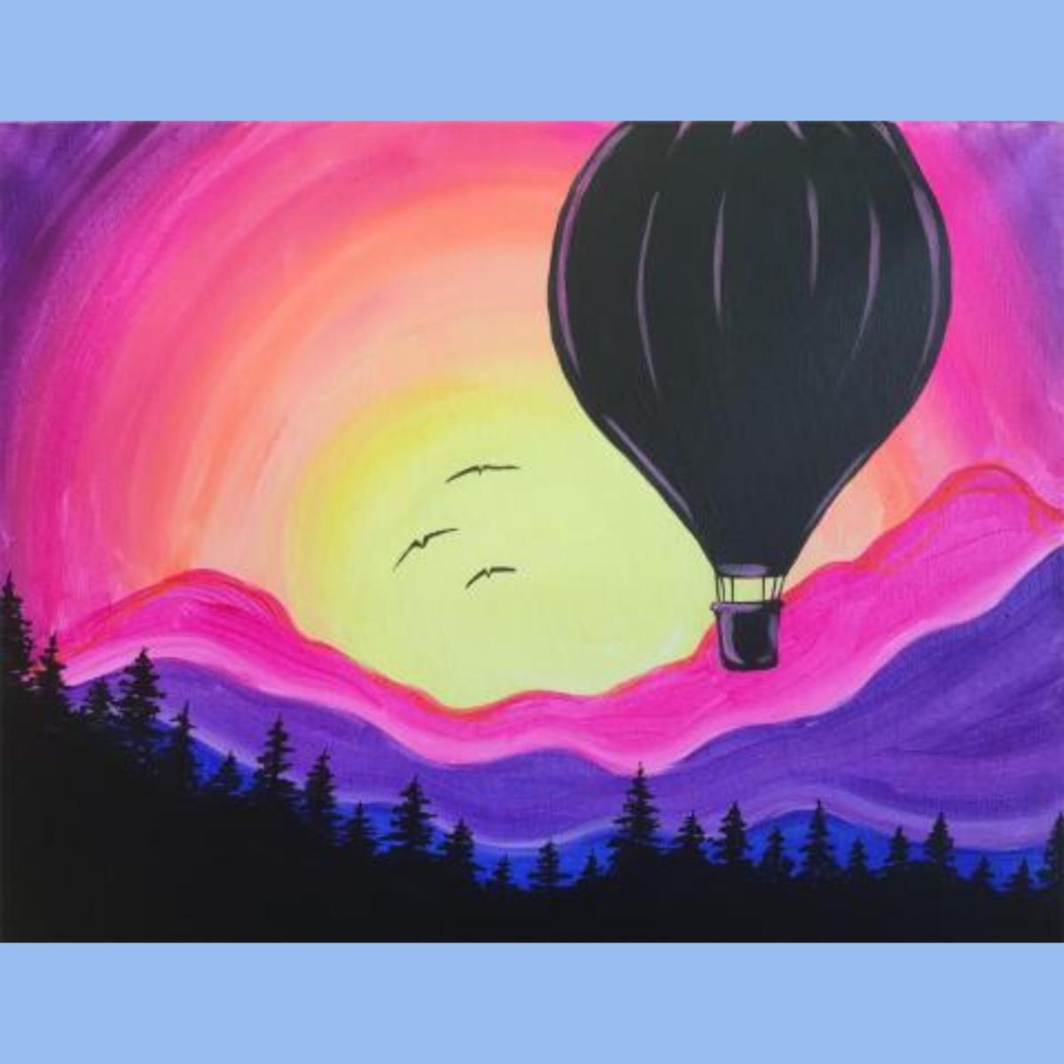 a purple sunset with black hot air balloon