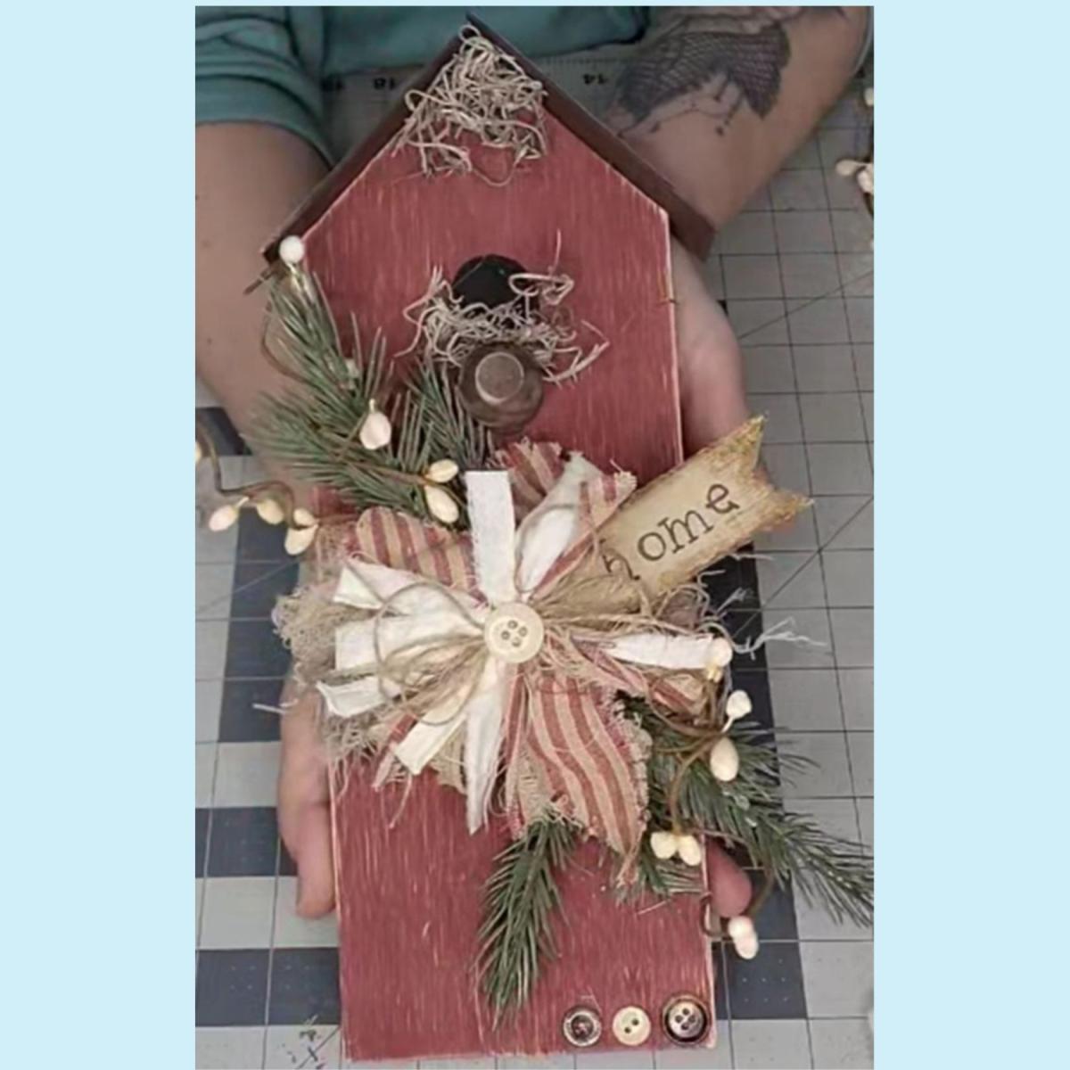 red rustic house with ribbon decoration