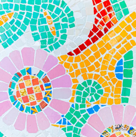 colorful mosaic tiles creating a flower pattern