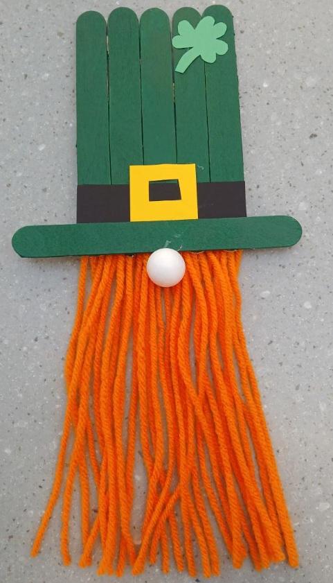 St. Patrick made out of popsicle sticks and yarn.
